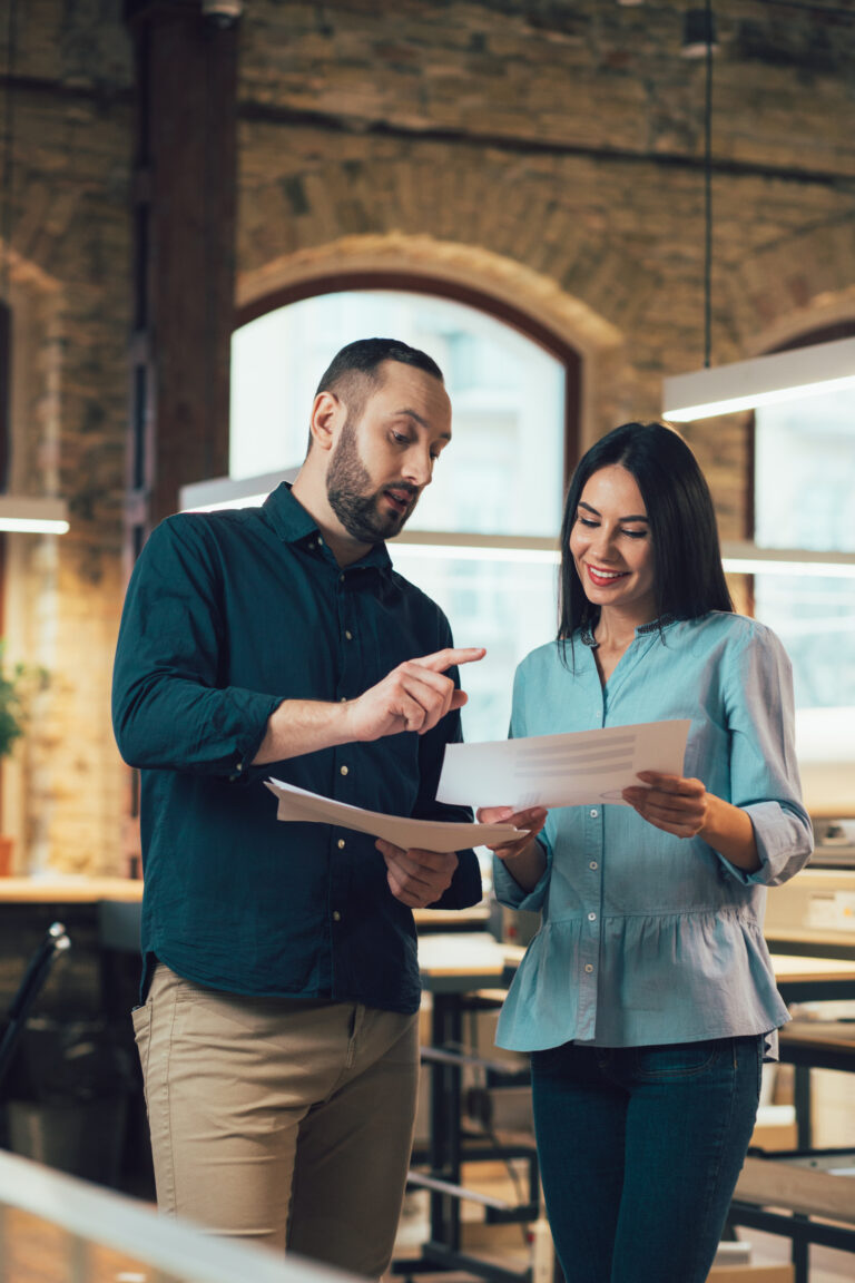 Serious man pointing to the graphic of woman stock photo